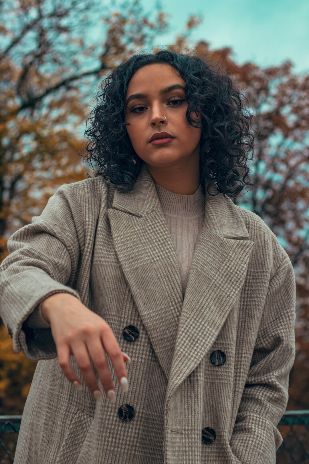 woman wearing oversized coat