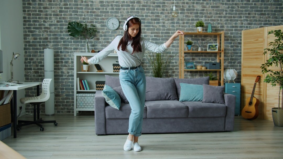 woman listening to music at home